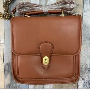 The sense of function top handle crossbody.